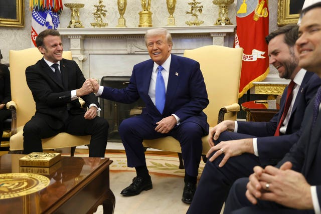 Emmanuel Macron locks hands with Donald Trump in the Oval Office as US vice president JD Vance and US secretary of state Marco Rubio watch