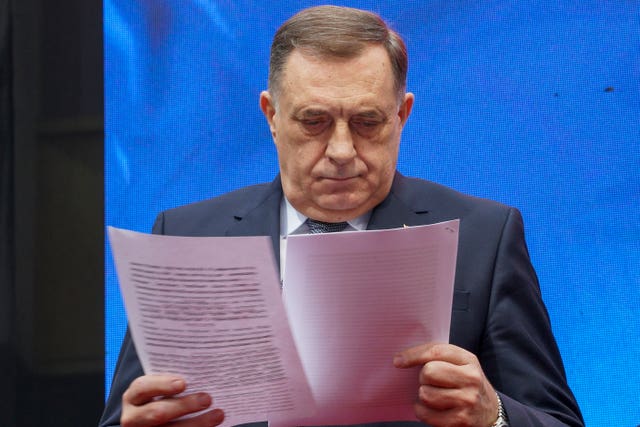 Bosnian Serb President Milorad Dodik reading papers