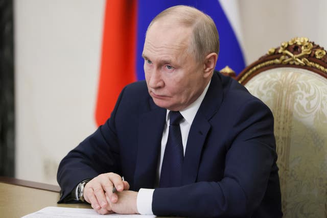 Russian President Vladimir Putin attends a cabinet meeting in Moscow