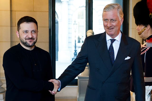 Belgium’s King Philippe, right, greets Ukraine’s President Volodymyr Zelenskyyprior to a meeting at the Royal Palace in Brussels 