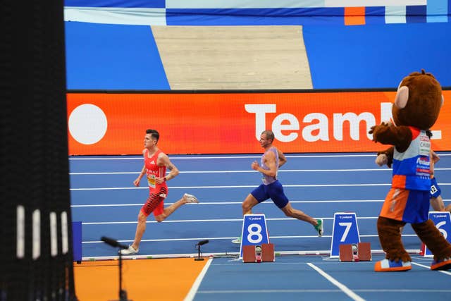 George Mills, second left, chases Jakob Ingebritsen