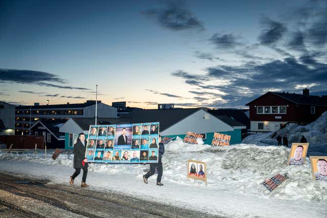 Voters in a snowy backdrop