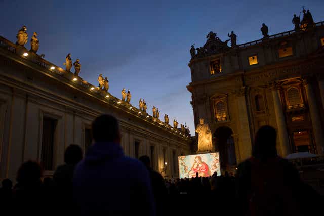 People attend a Rosary prayer for Pope Francis,