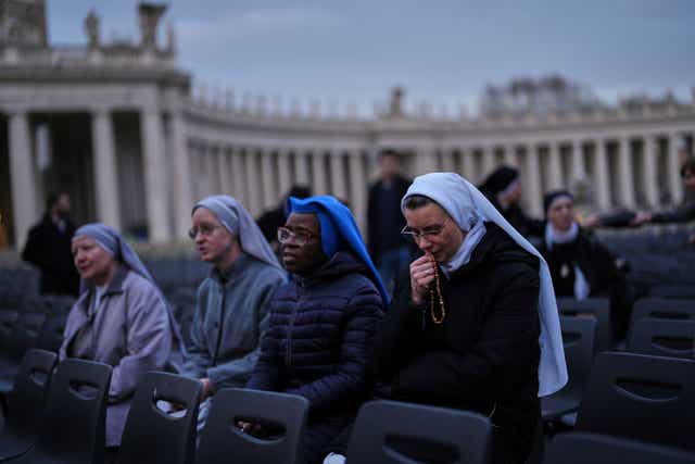 Nuns pray during a Rosary prayer for Pope Francis