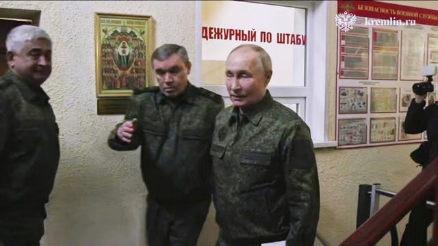 Russian President Vladimir Putin, right, with by Russian chief of general staff General Valery Gerasimov at a military headquarters in the Kursk region 