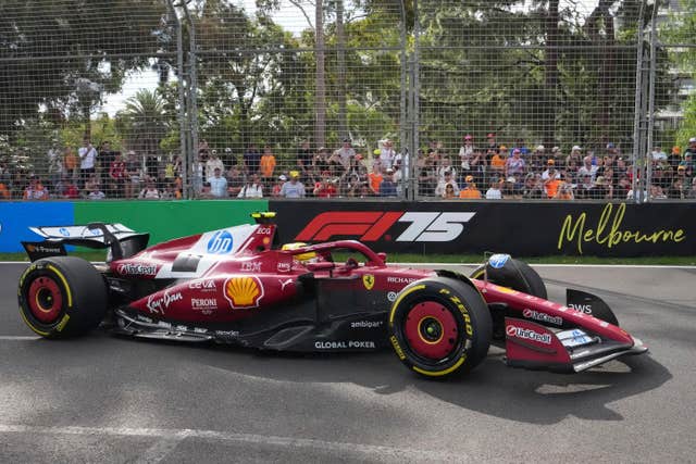 Ferrari driver Lewis Hamilton of Britain steers his car during the second practice session for the Australian Formula One Grand Prix at Albert Park