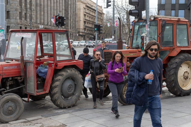 Pro-president supporters park tractors