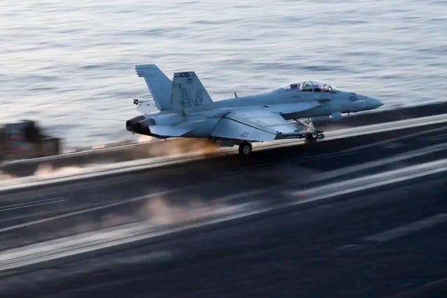 An aircraft launching from the USS Harry S Truman