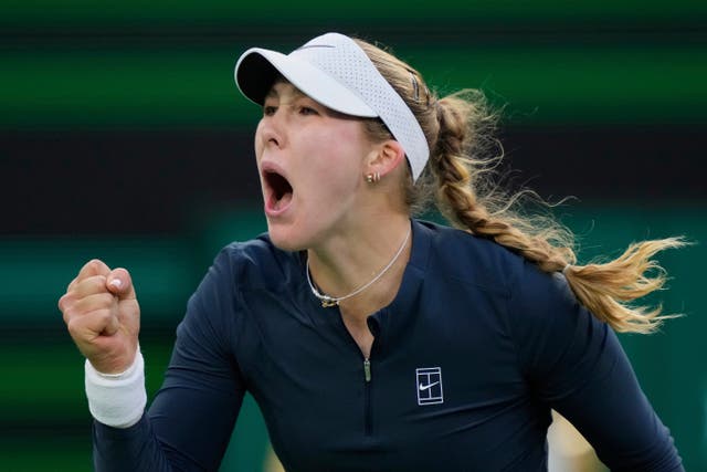 Mirra Andreeva, of Russia, celebrates winning a point against Iga Swiatek