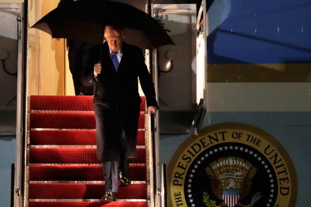 President Donald Trump walks down the stairs of Air Force One upon his arrival at Joint Base Andrews, Maryland