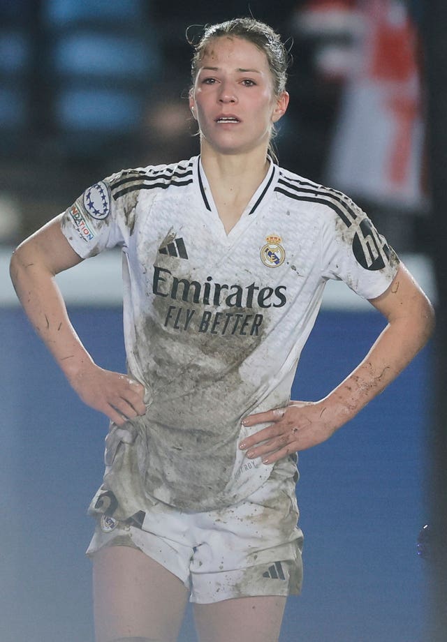 Real Madrid’s Melanie Leupolz stands watching after coming off injured during the Women’s Champions League quarterfinal first leg soccer match between Real Madrid and Arsenal at the Alfredo di Stefano stadium in Madrid, Spain, Tuesday March 18, 2025. 