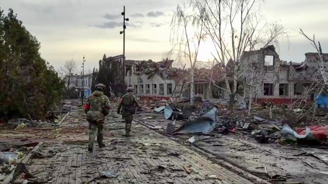 Russian soldiers patrol an area in Sudzha, in the Kursk region of Russia, after it was taken over by Russian troops