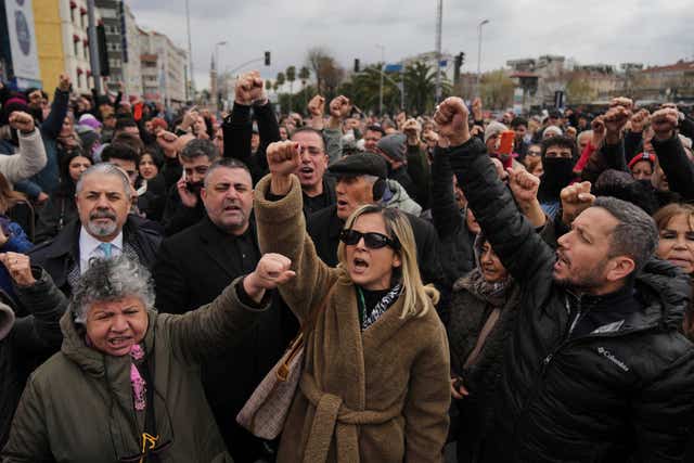 People chant slogans as they protest outside the Vatan Security Department