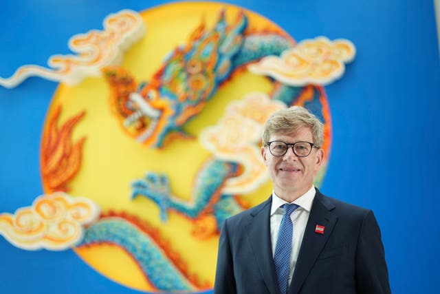 Niels Christiansen poses for a photo at Lego factory in Binh Duong