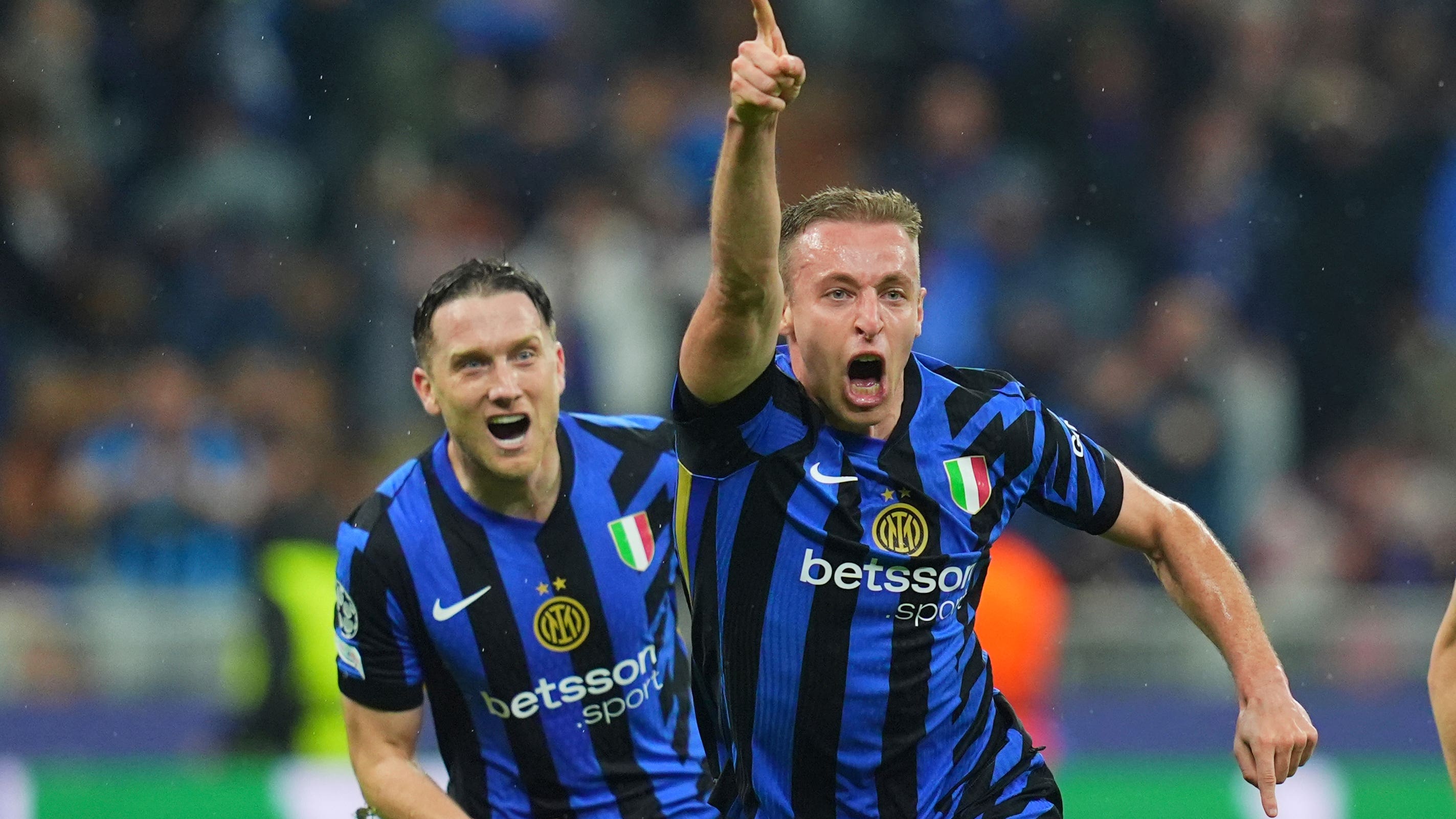 Davide Frattesi (centre) celebrates after scoring Inter Milan’s Champions League semi-final winner against Barcelona (Spada/LaPresse via AP)
