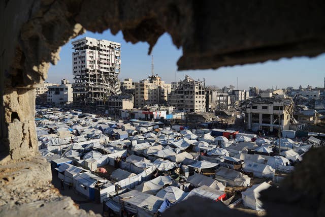 A makeshift tent camp for displaced Palestinians stretches across Gaza City 