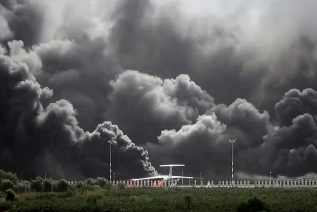 Smoke billowing from civilian aircraft following Israeli airstrikes on Sanaa International Airport in Sanaa, Yemen, on Tuesday 