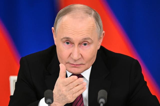Head and shoulders photo of Vladimir Putin