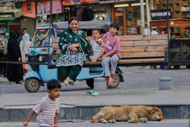 A woman and her children in Srinagar, in Indian controlled Kashmir