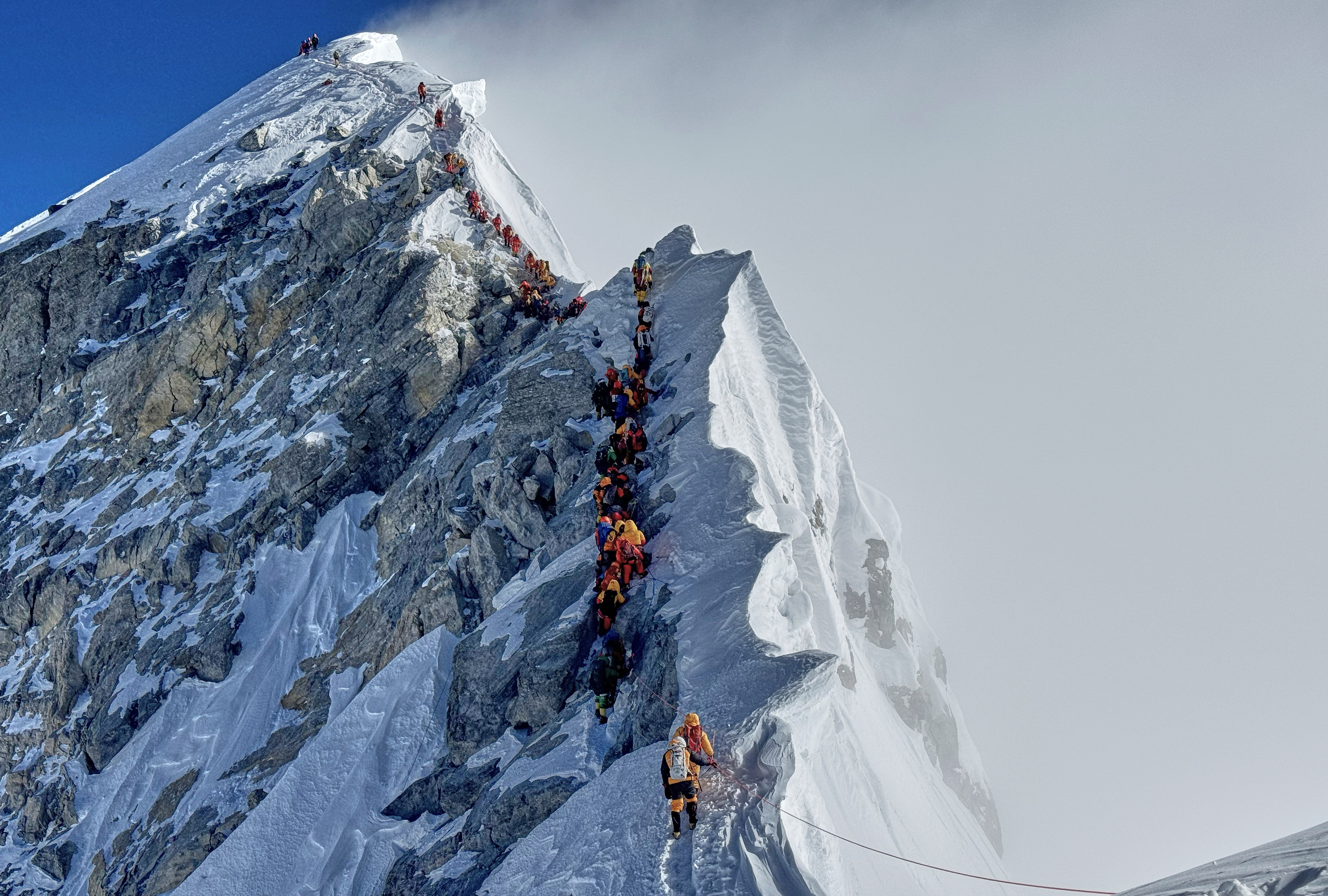 Mount Everest season opens late with climbers undeterred by huge