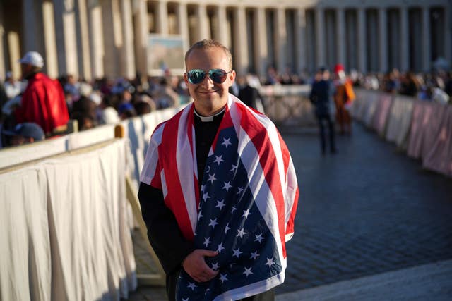 A man wrapped in a US flag