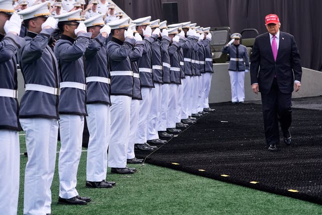 Donald Trump arrives to deliver the commencement speech 