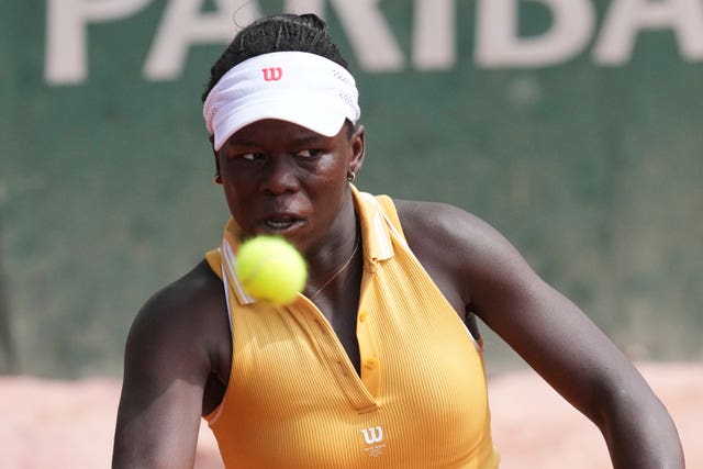 Canada’s Victoria Mboko returns the ball (Christophe Ena/AP)