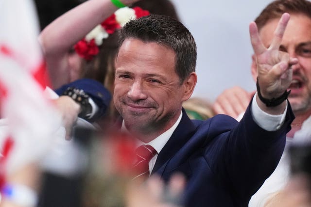 Presidential candidate Rafal Trzaskowski greets supporters