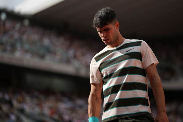Spain’s Carlos Alcaraz looks down as he plays Ben Shelton at the French Open