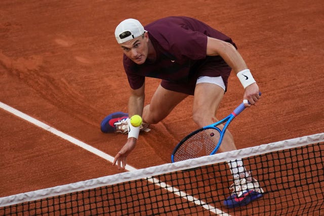 Jack Draper plays a shot