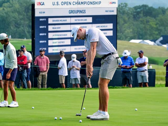 Matt Vogt works on the  green before a practice round for the 2025 US Open at Oakmont Country Club