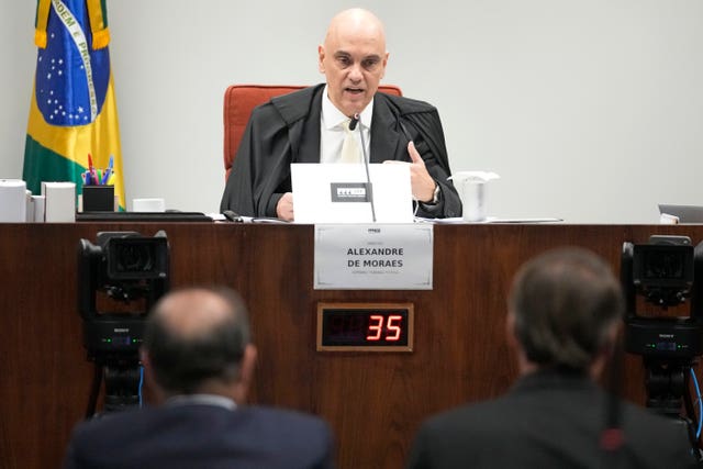 Supreme Court Judge Alexandre de Moraes hearing evidence from Brazil’s former president Jair Bolsaro in Brasilia