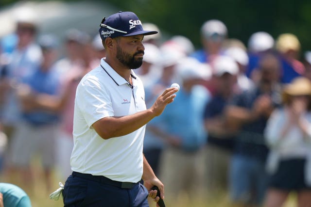J.J Spaun reacts to a putt