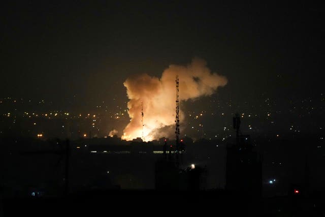 Smoke rises up after an explosion in Tehran,