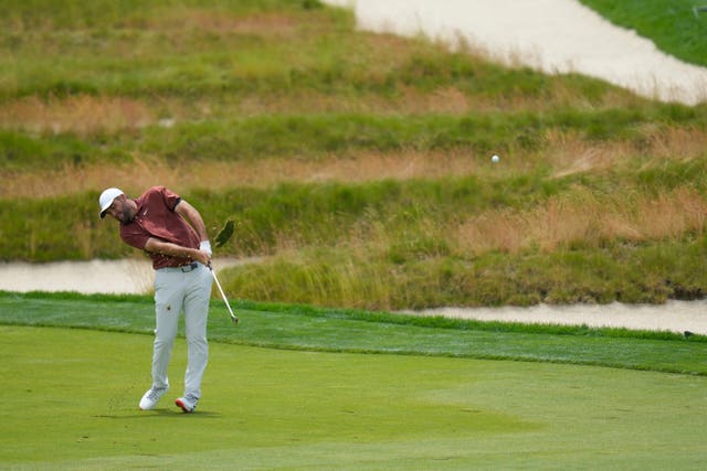 Scottie Scheffler hits from the third fairway during the third round of the US Open