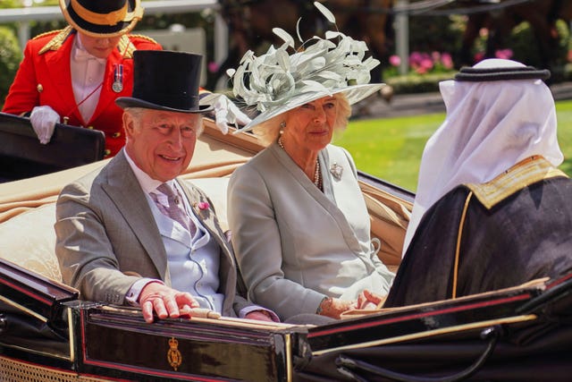 Charles and Camilla in a carriage