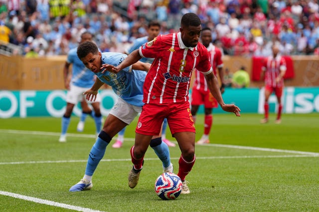 Rico Lewis, left, in action for Manchester City against Wydad Casablanca
