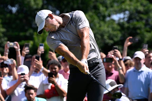 Rory McIlroy hits off the first tee during the first round of the Travelers Championship PGA Tour golf tournament in Cromwell