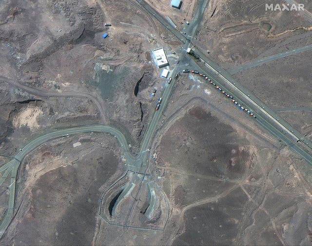 This satellite image provided by Maxar Technologies shows vehicles at the Fordo enrichment facility in Iran on June 19, 2025. 