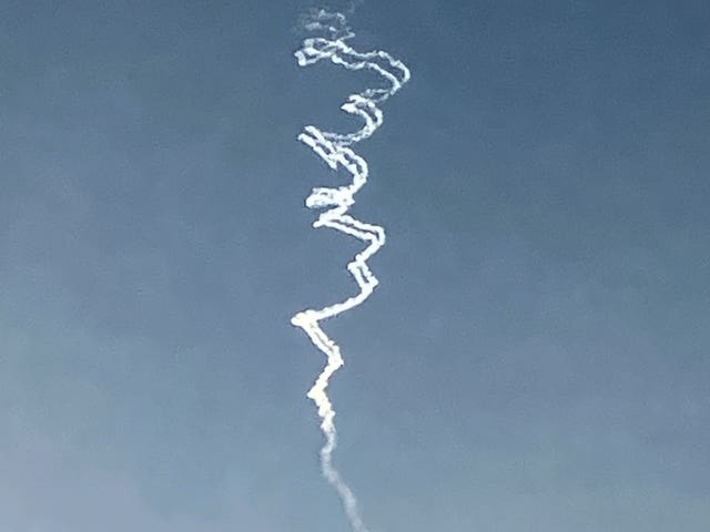 Smoke trails from Israeli air defence system are seen in the sky as it intercepts missiles launched during an Iranian attack on Tuesday