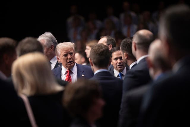 US President Donald Trump, left, and US secretary of state Marco Rubio arrive before the start of a plenary session of the Nato summit of heads of state and government in The Hague, Netherlands 