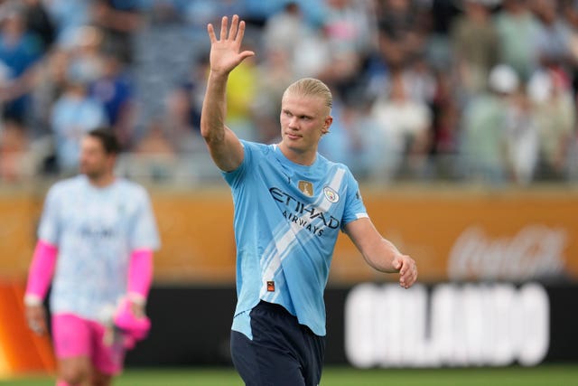 Manchester City’s Erling Haaland raises his arm as he walks off the pitch after the Club World Cup against Juventus