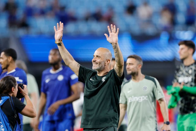 Chelsea coach Enzo Maresca waves to the crowd at the end of the Club World Cup round of 16 match between Benfica and Chelsea in Charlotte, N.C., Saturday, June 28