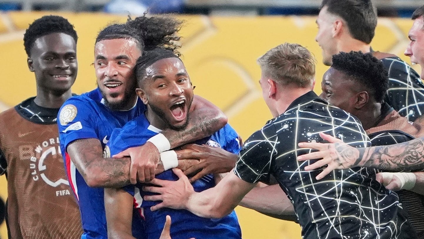 Chelsea’s Christopher Nkunku is congratulated after scoring his team’s second goal (Chris Carlson/AP)