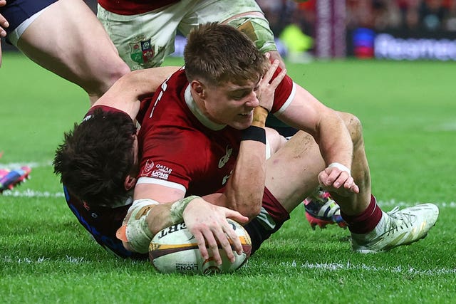 Tommy Freeman scores a try in Brisbane
