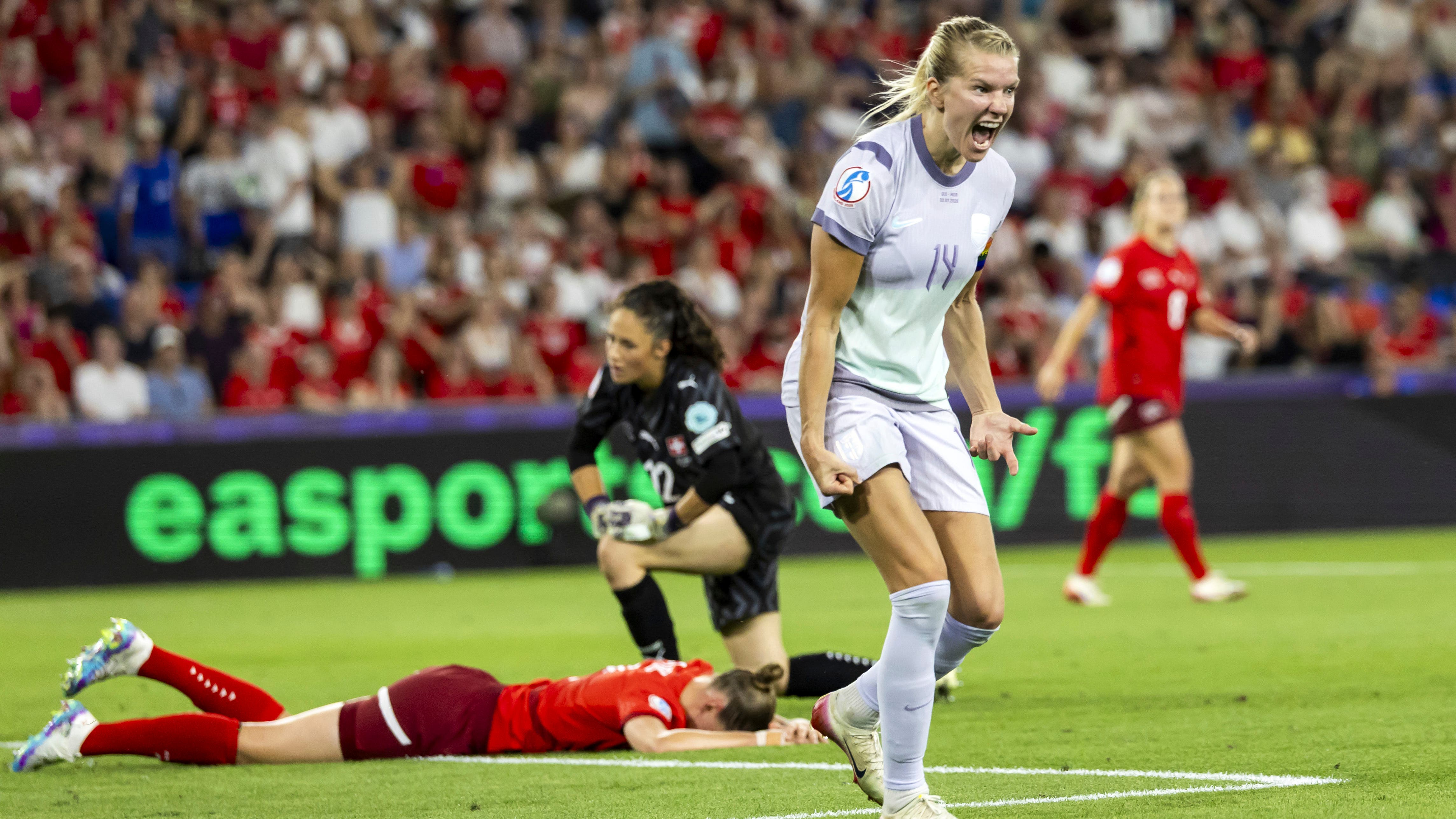 Norway forward Ada Hegerberg celebrates the own goal by Switzerland’s Julia Stierli, on ground, which sealed Norway’s win (Michael Buholzer/Keystone via AP)
