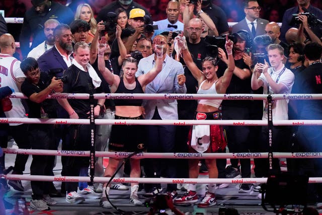 Ireland’s Katie Taylor, left, and Puerto Rico’s Amanda Serrano pose after the fight