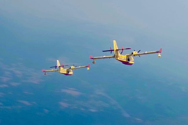 Two French Canadair water bombers flying over Spain