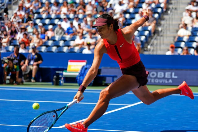 Emma Raducanu strikes a backhand