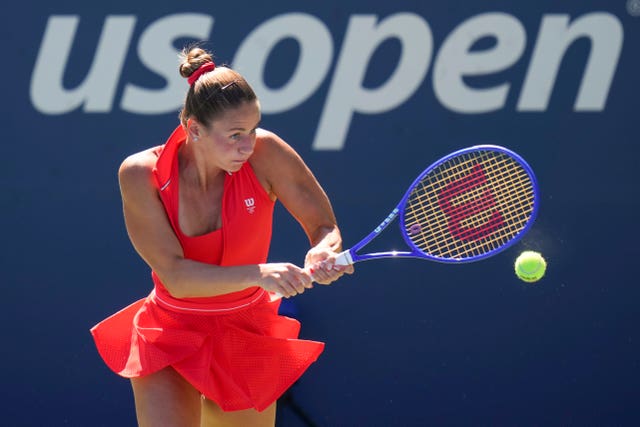 Marta Kostyuk hits a backhand